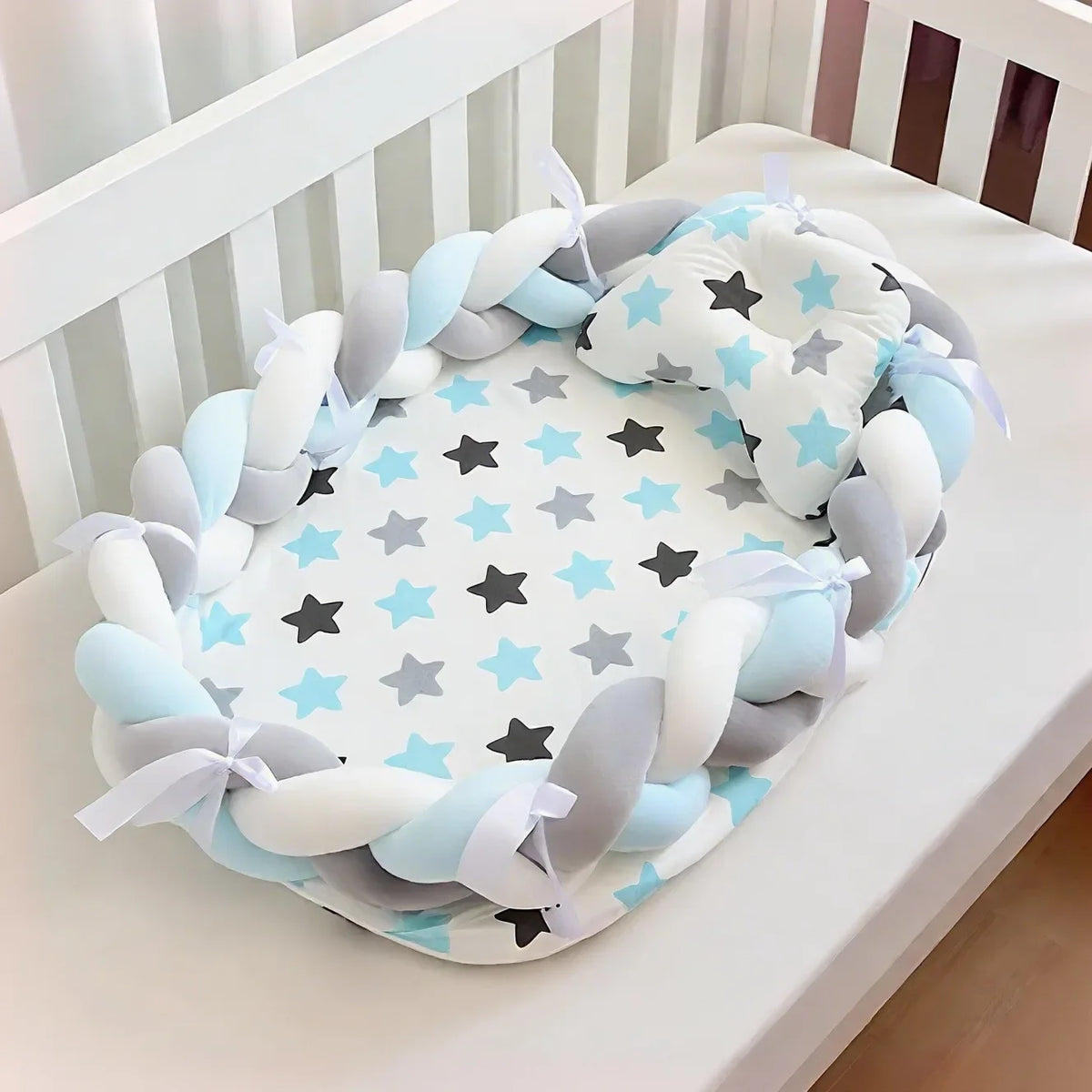 Réducteur de lit bébé tresse Gris