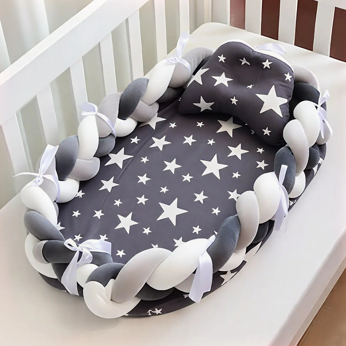 Réducteur de lit bébé tresse Gris