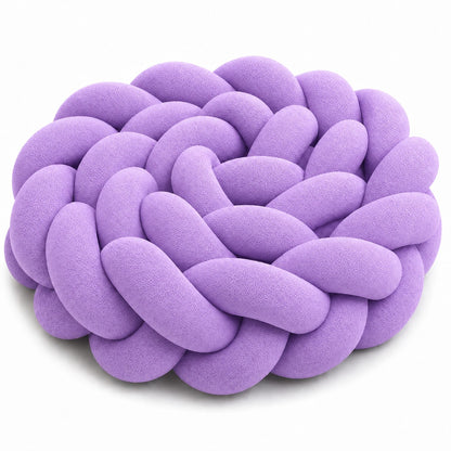 Tresse de lit bébé violette dans un berceau